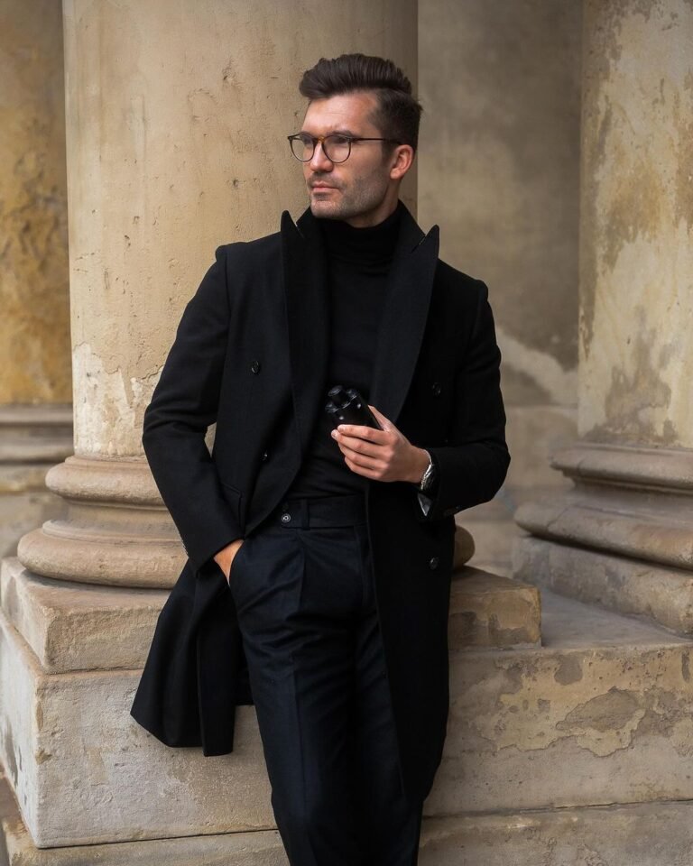 Instagram Old Money fashion influencer Justus F. Hansen in an all-black winter outfit