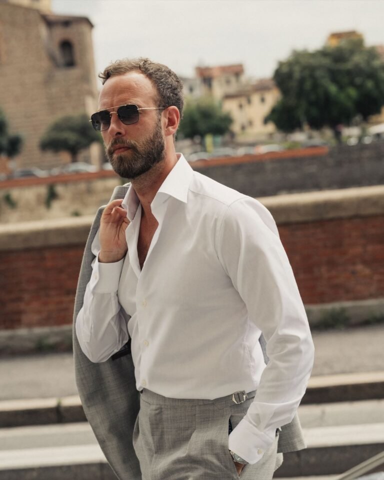 Instagram Old Money Style influencer Andreas Weinås in a white dress shirt from Eton